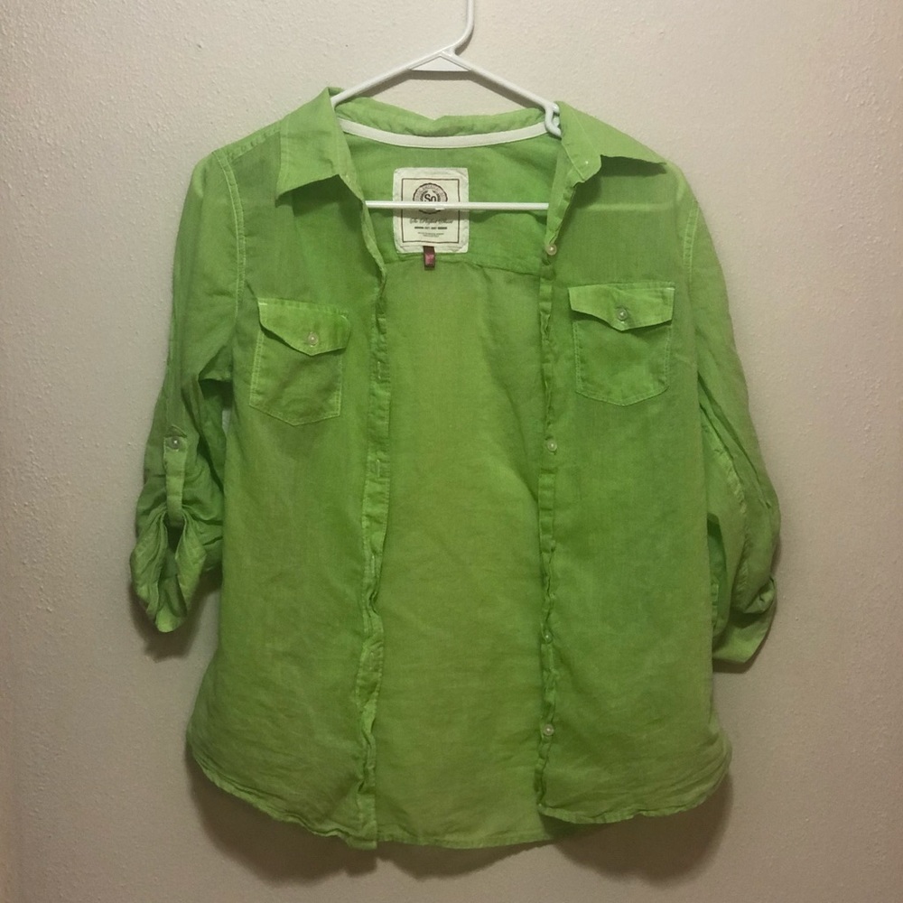 A green size large in girls button up with a cool arm look.
